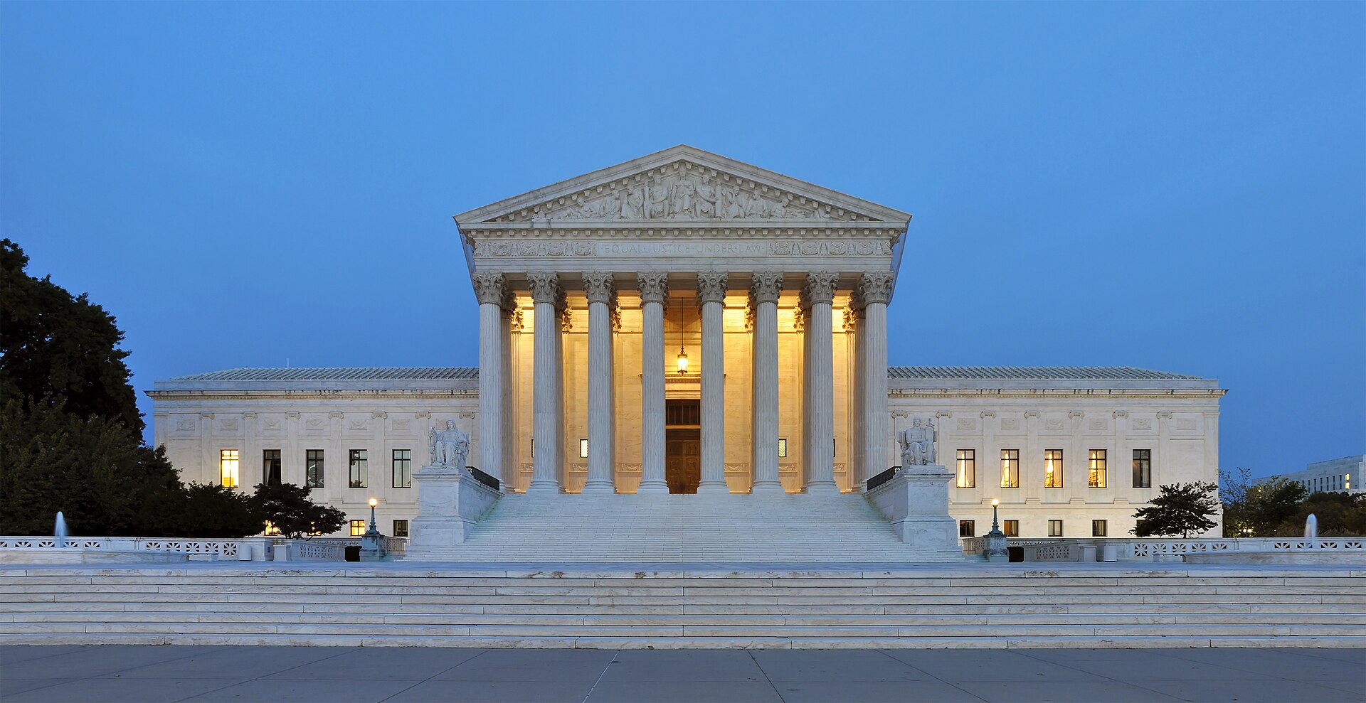 West facade of the U.S. Supreme Court Building at dusk.