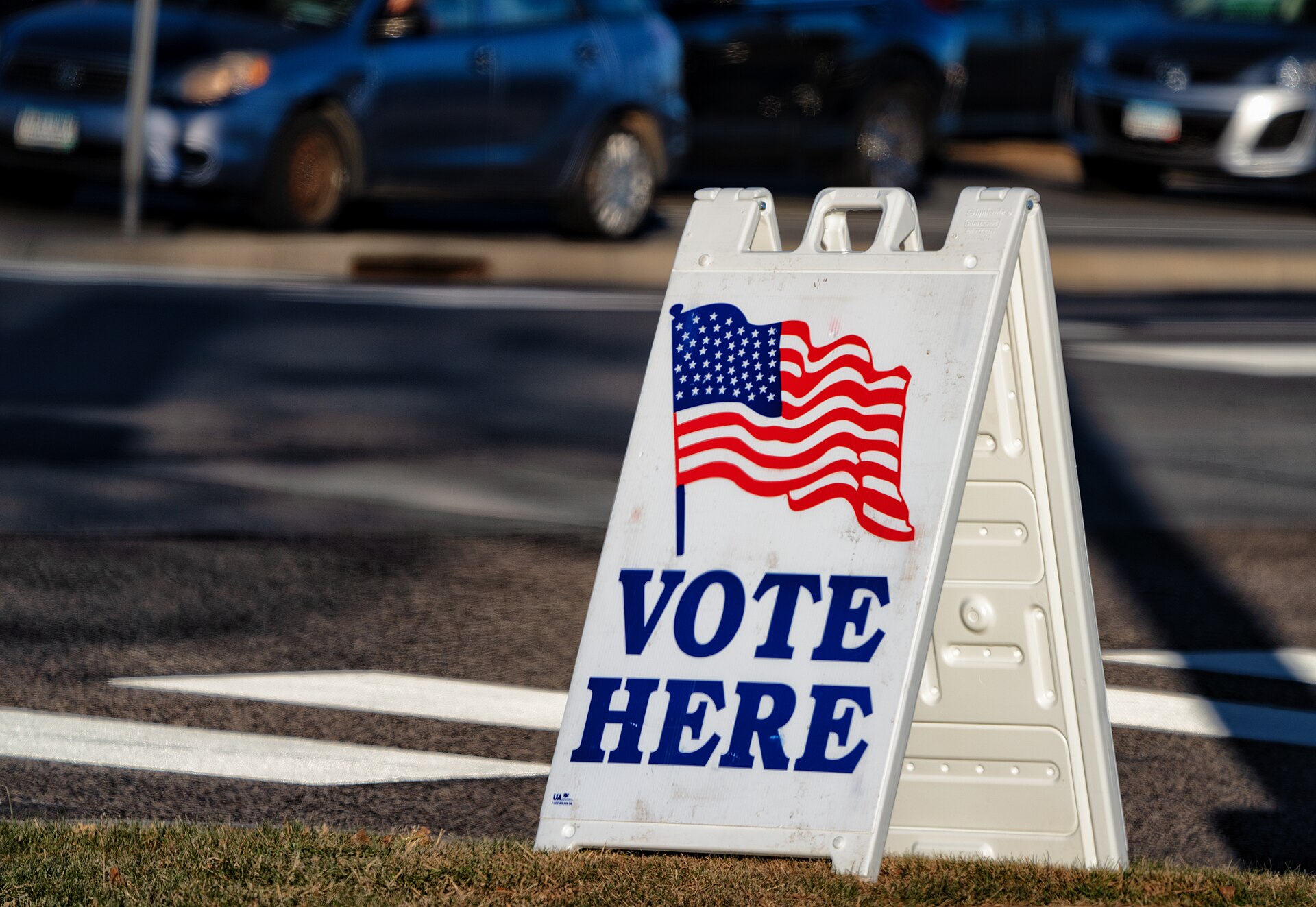 A Vote Here sign outside a polling place.